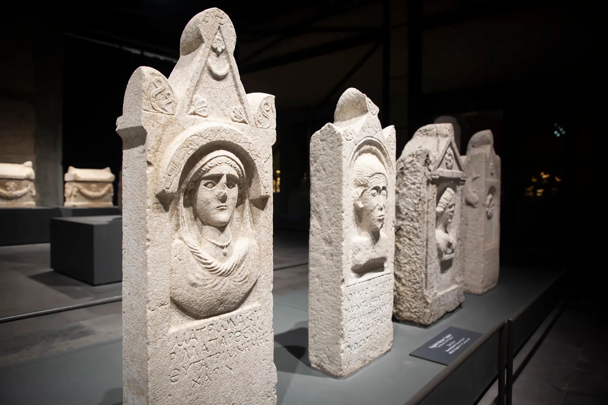 Ancient stelae in a museum exhibition